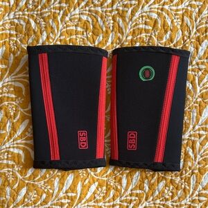 SBD Black and Red Elbow Sleeves - S